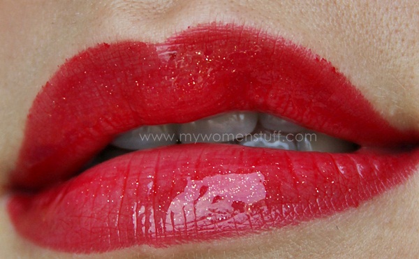 holiday red sparkly lipstick on lips