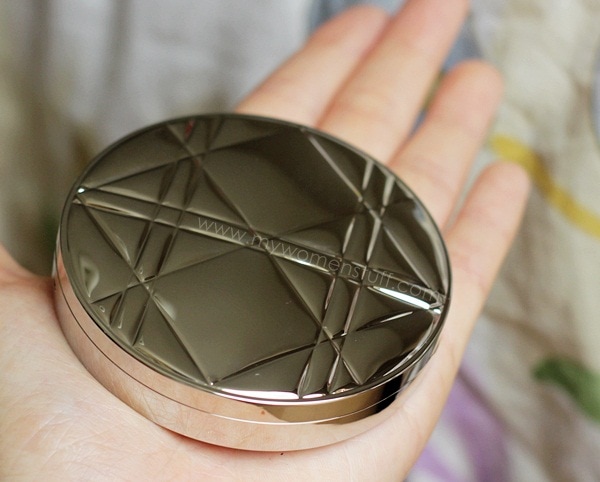 diorskin nude tan aurora compact in hand